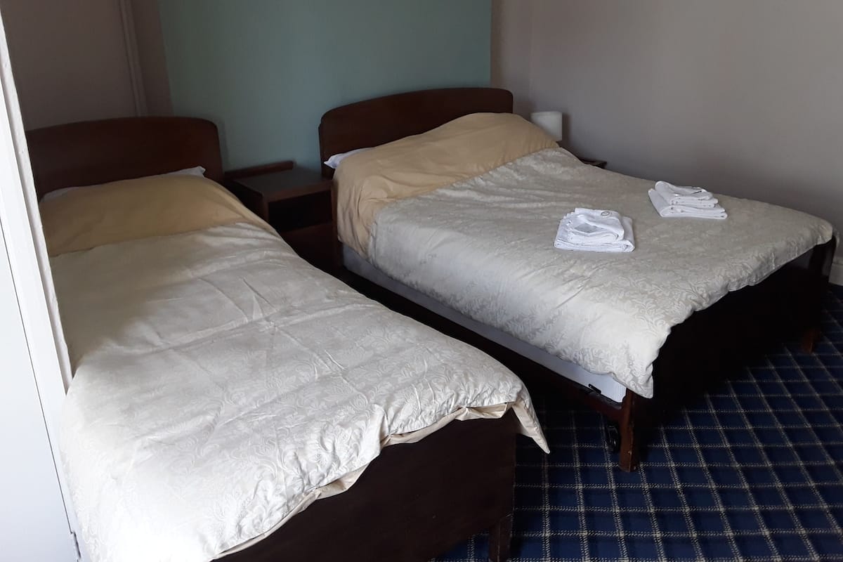Habitación familiar (2 Adults + 1 Child ) | Ropa de cama