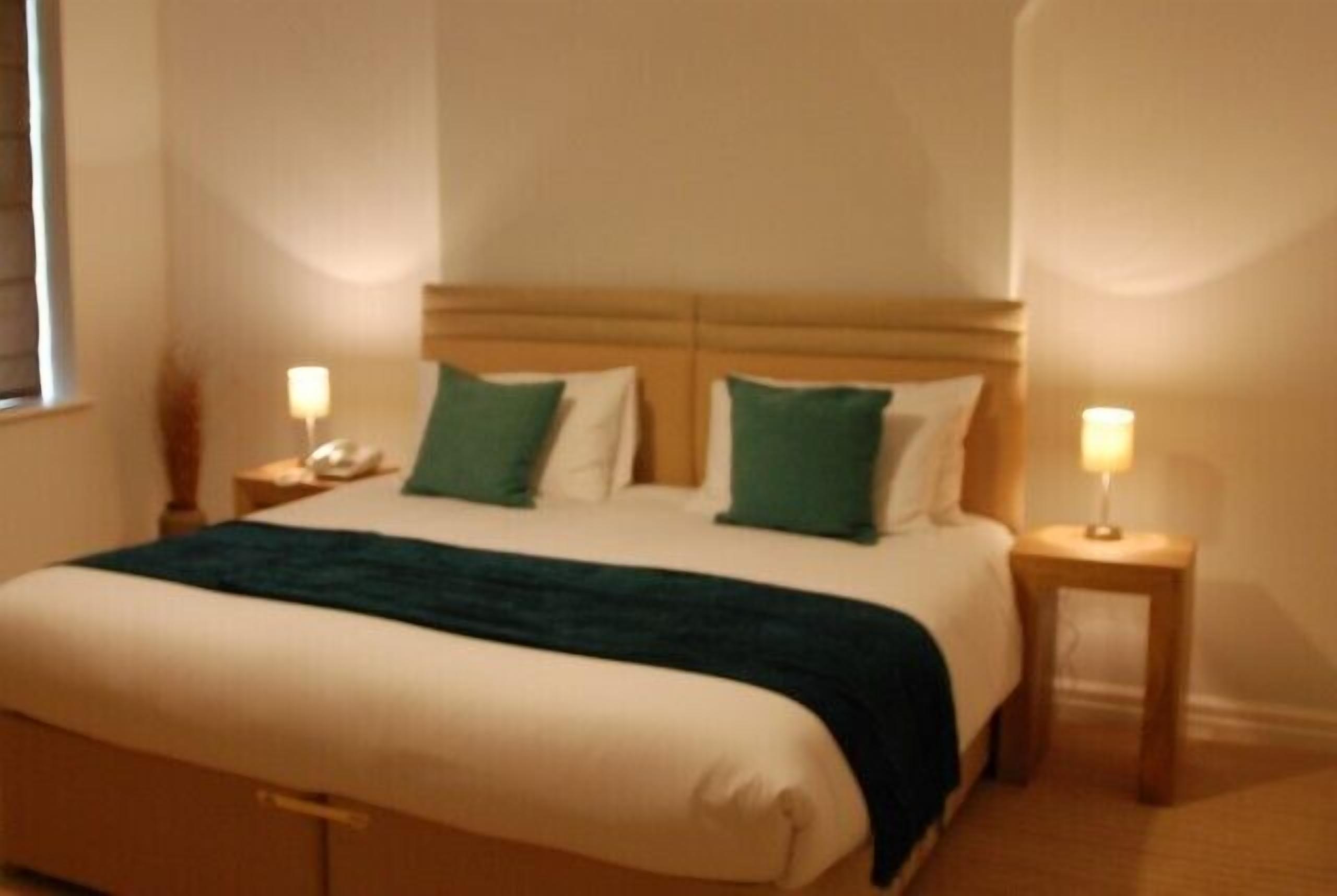 premium bedding, desk, laptop workspace, soundproofing