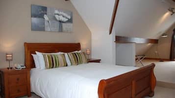 Premium bedding, desk, laptop workspace, soundproofing