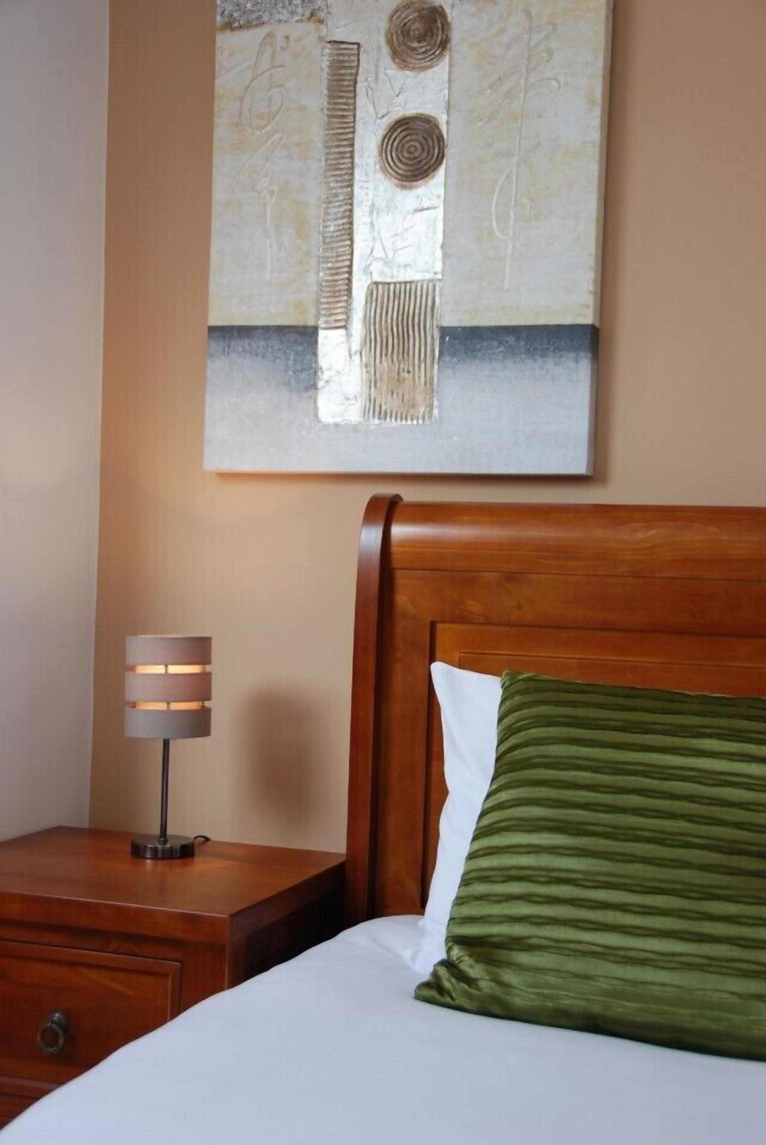 premium bedding, desk, laptop workspace, soundproofing