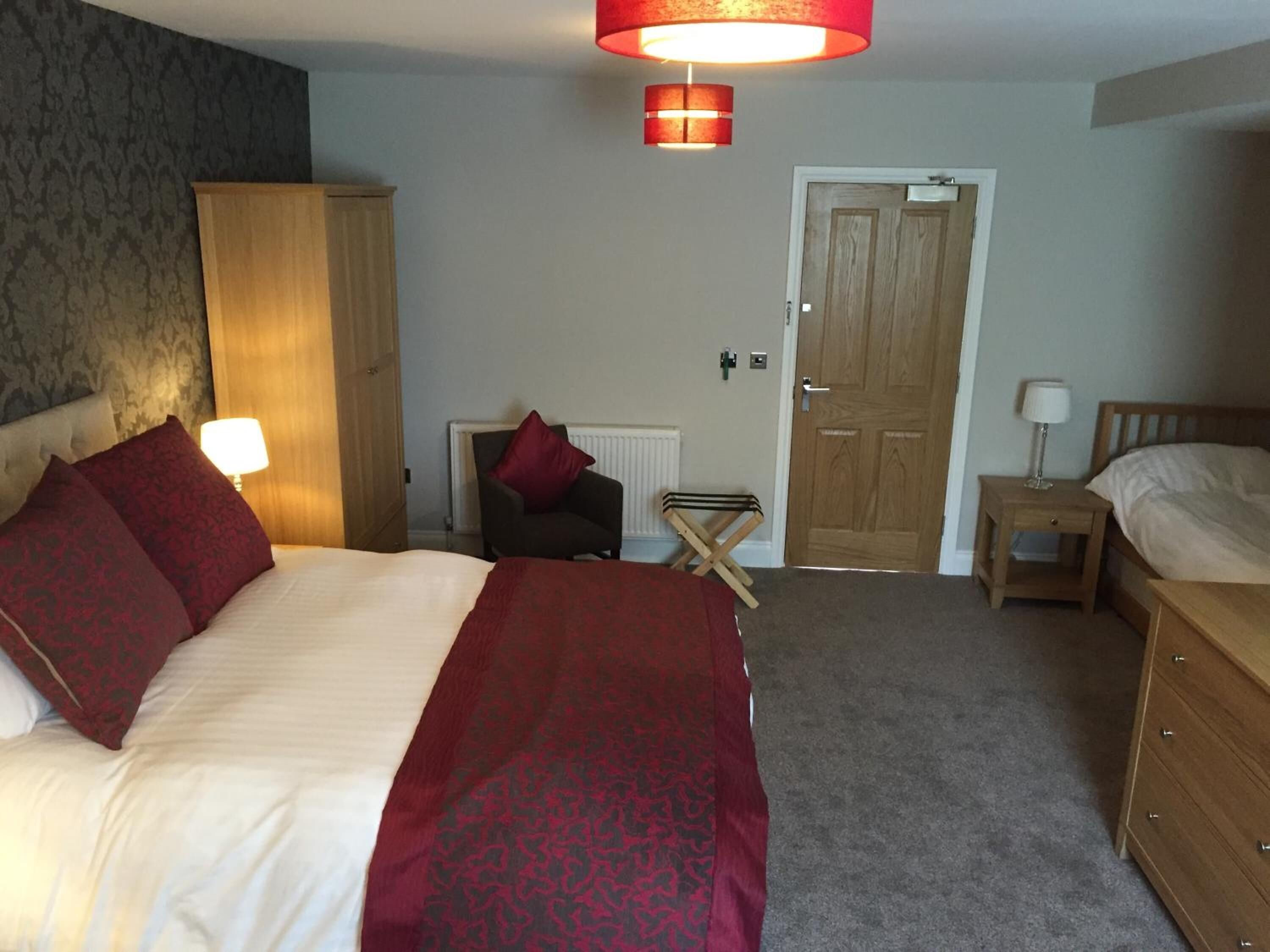 premium bedding, desk, laptop workspace, blackout curtains