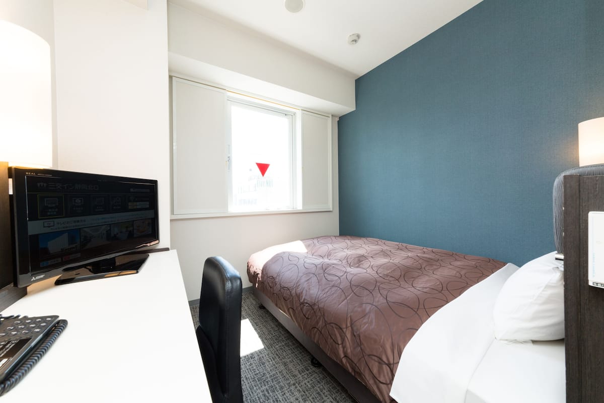 desk, blackout curtains, iron/ironing board, free wifi