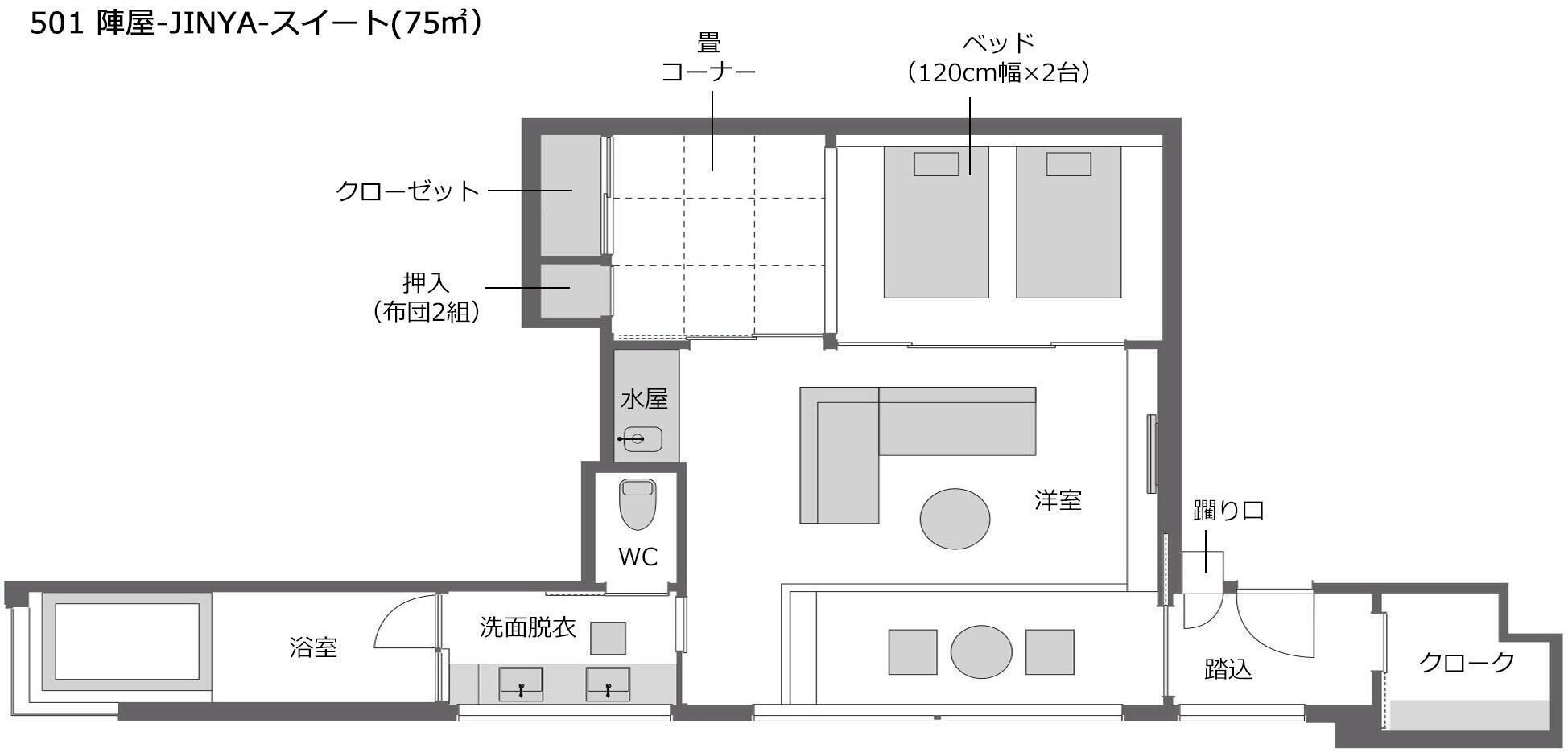 Un plan d’étage d’une chambre d’hôtel comprenant une salle de bain, des toilettes, un espace de vie et un petit balcon.