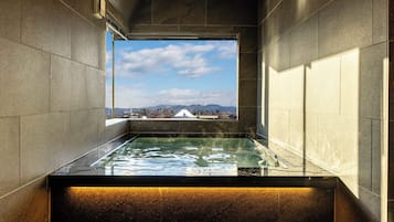 Luxury Suite | Bathroom | Separate tub and shower, deep soaking tub, free toiletries, hair dryer