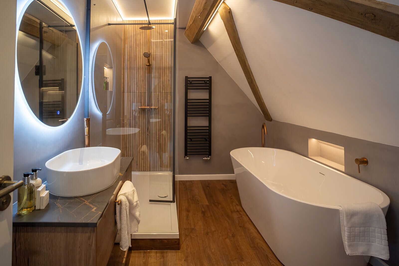 luxury studio suite | bathroom | free toiletries, hair dryer, towels, shampoo