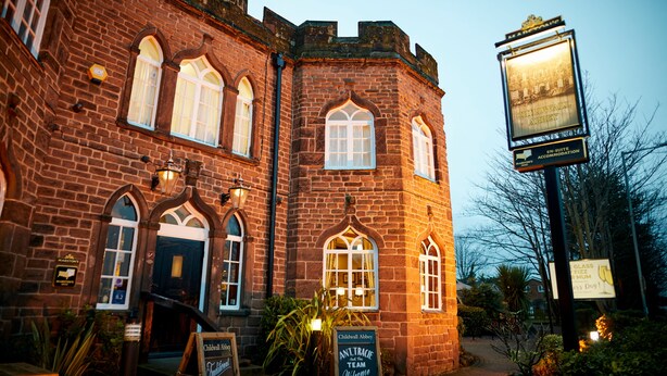 A historic brick building with arched windows and a signboard. - Childwall Abbey, by Marstons Inns  (Liverpool)