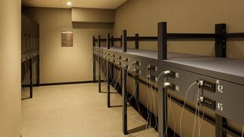 A row of bunk beds with individual electrical outlets numbered 36 to 45.
