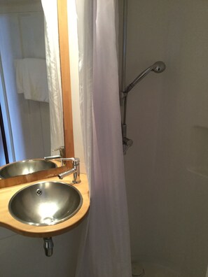 Shower, free toiletries, hair dryer, towels