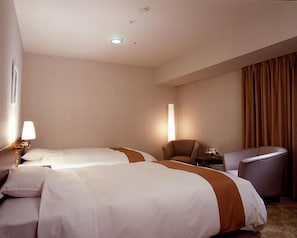 Roupas de cama premium, quartos à prova de som, Wi-Fi de cortesia