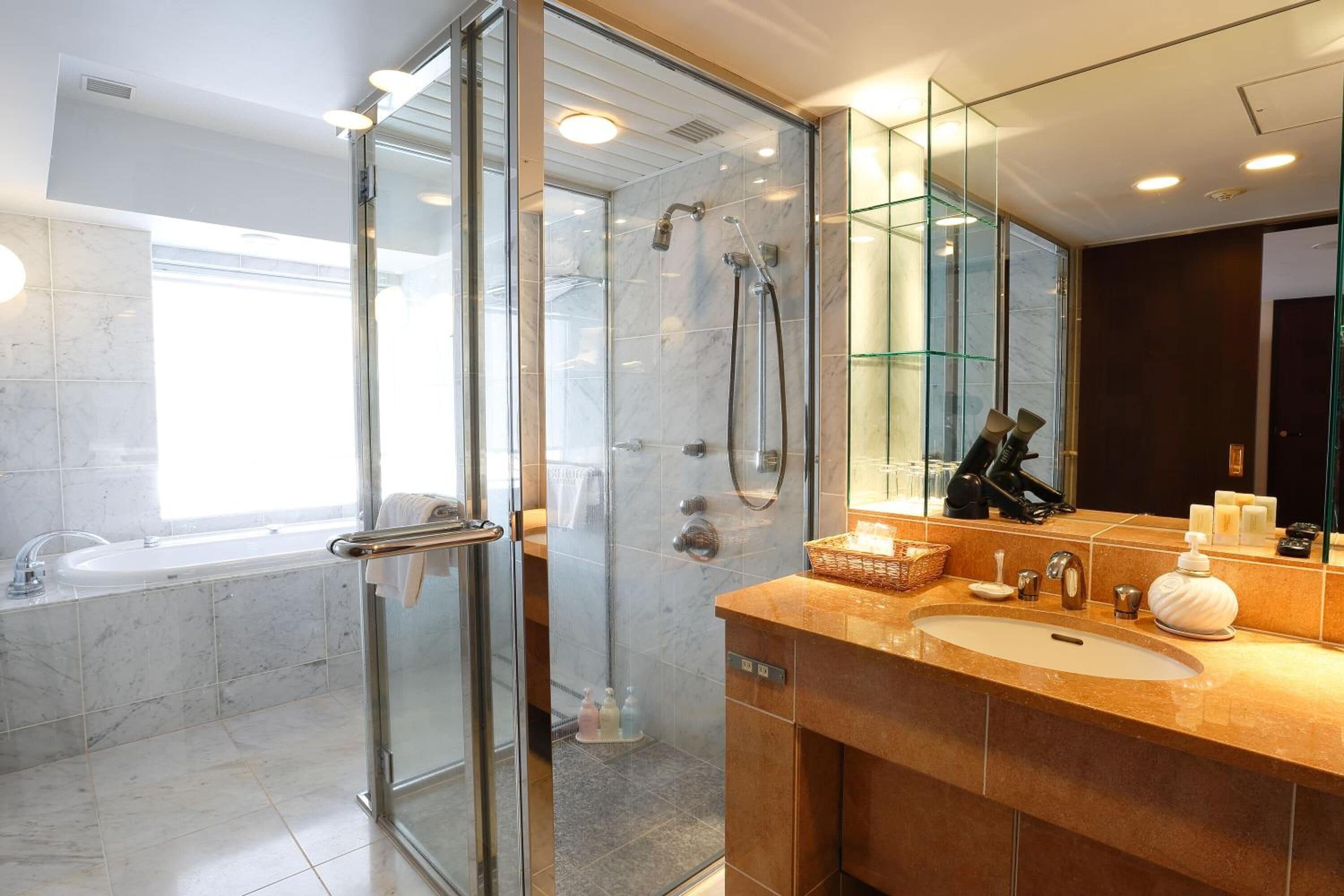 combined shower/bathtub, free toiletries, hair dryer, slippers