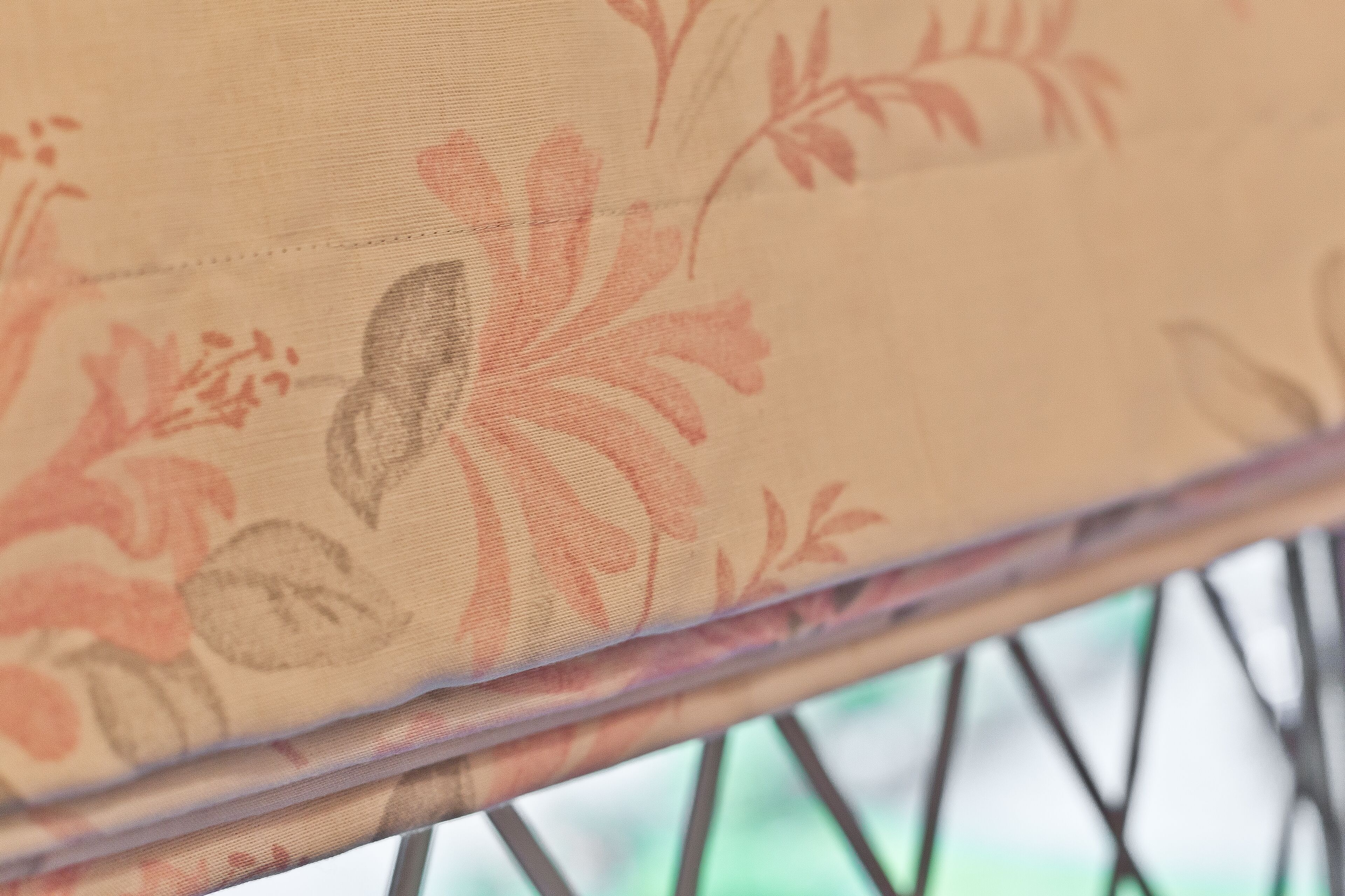 A close-up of a fabric with a floral pattern.