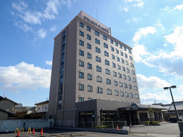 A multi-story hotel with a modern design, featuring a prominent entrance and a flat roof. - Iga Ueno City Hotel (Iga)