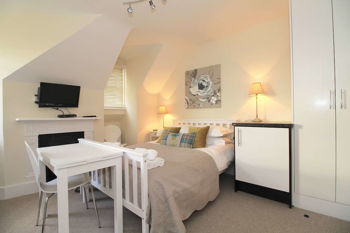 1 bedroom, desk, laptop workspace, iron/ironing board