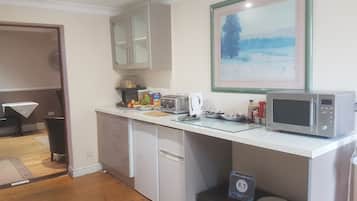 Fridge, microwave, coffee/tea maker, electric kettle