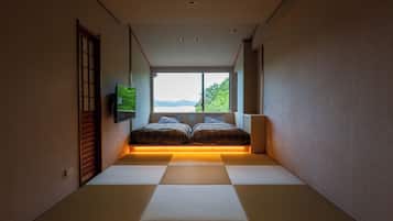 Neljän hengen executive-huone, 1 makuuhuone, oma kylpyhuone (With open-air bath, Wi-Fi) | Ylelliset vuodevaatteet, tallelokero huoneessa, ilmainen Wi-Fi