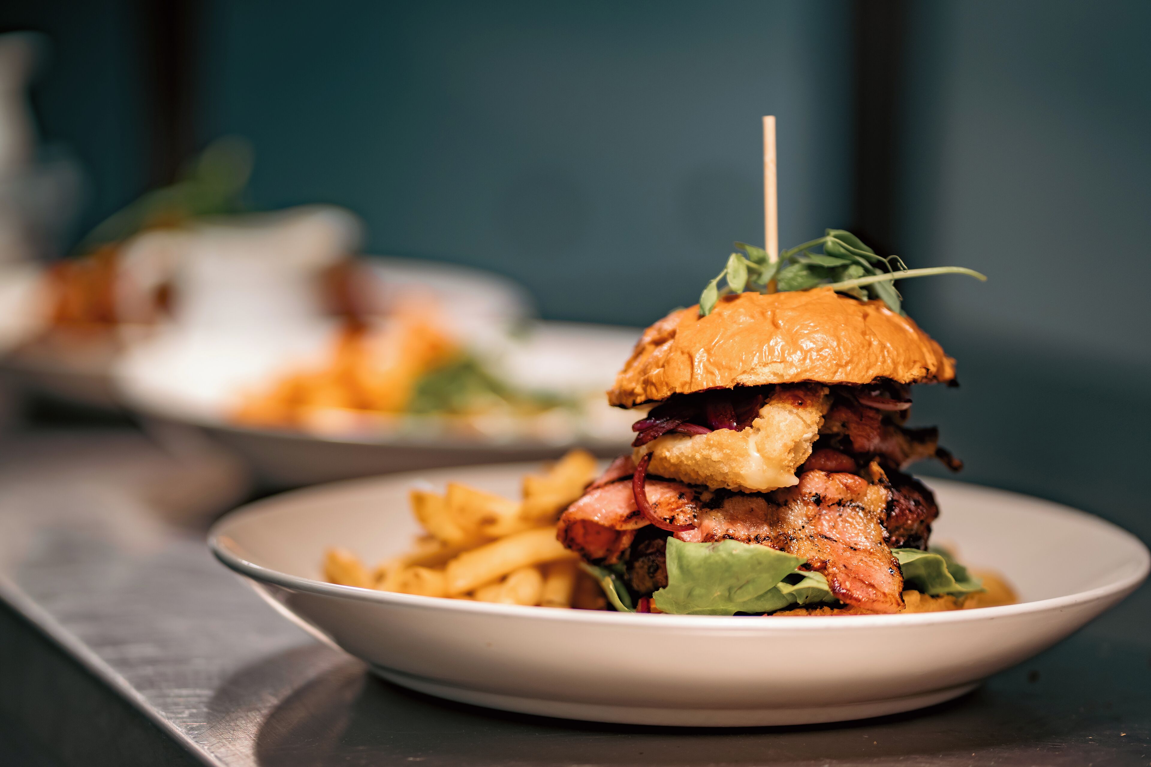 A plate with a burger and fries.