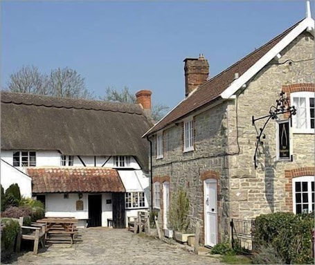 Exterior. The Compasses Inn