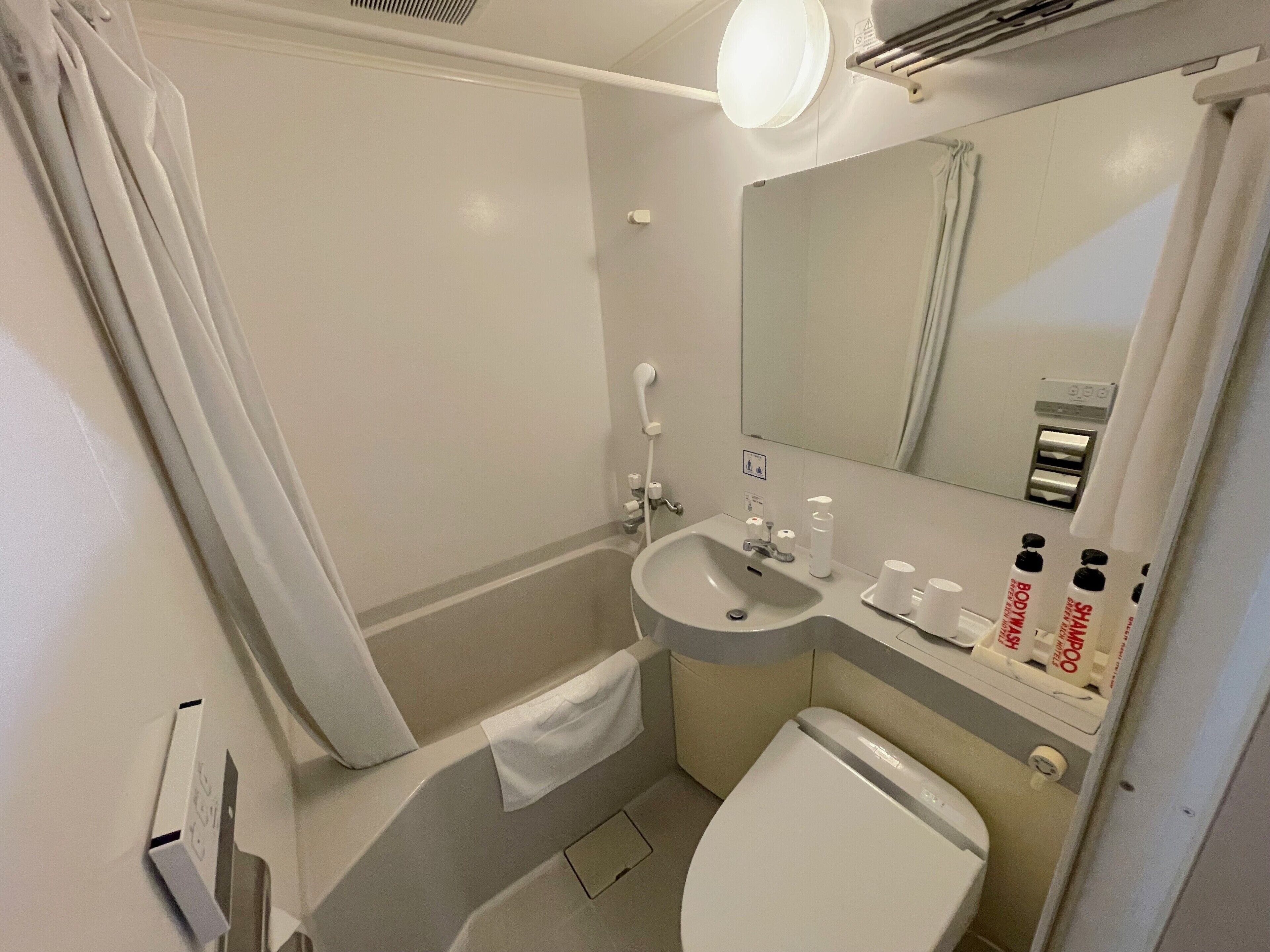 Shower, free toiletries, hair dryer, slippers