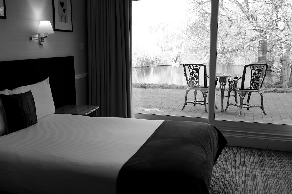Double Room, Lakeside | Desk, laptop workspace, iron/ironing board (on request), free WiFi