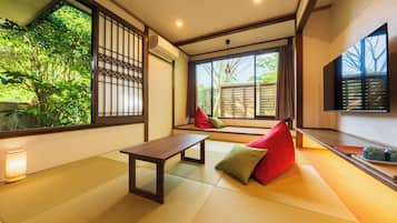 Japanese Style Room with Shared Bathroom | Desk, laptop workspace, iron/ironing board, bed sheets