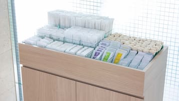 A display of various toiletries in a hotel setting.
