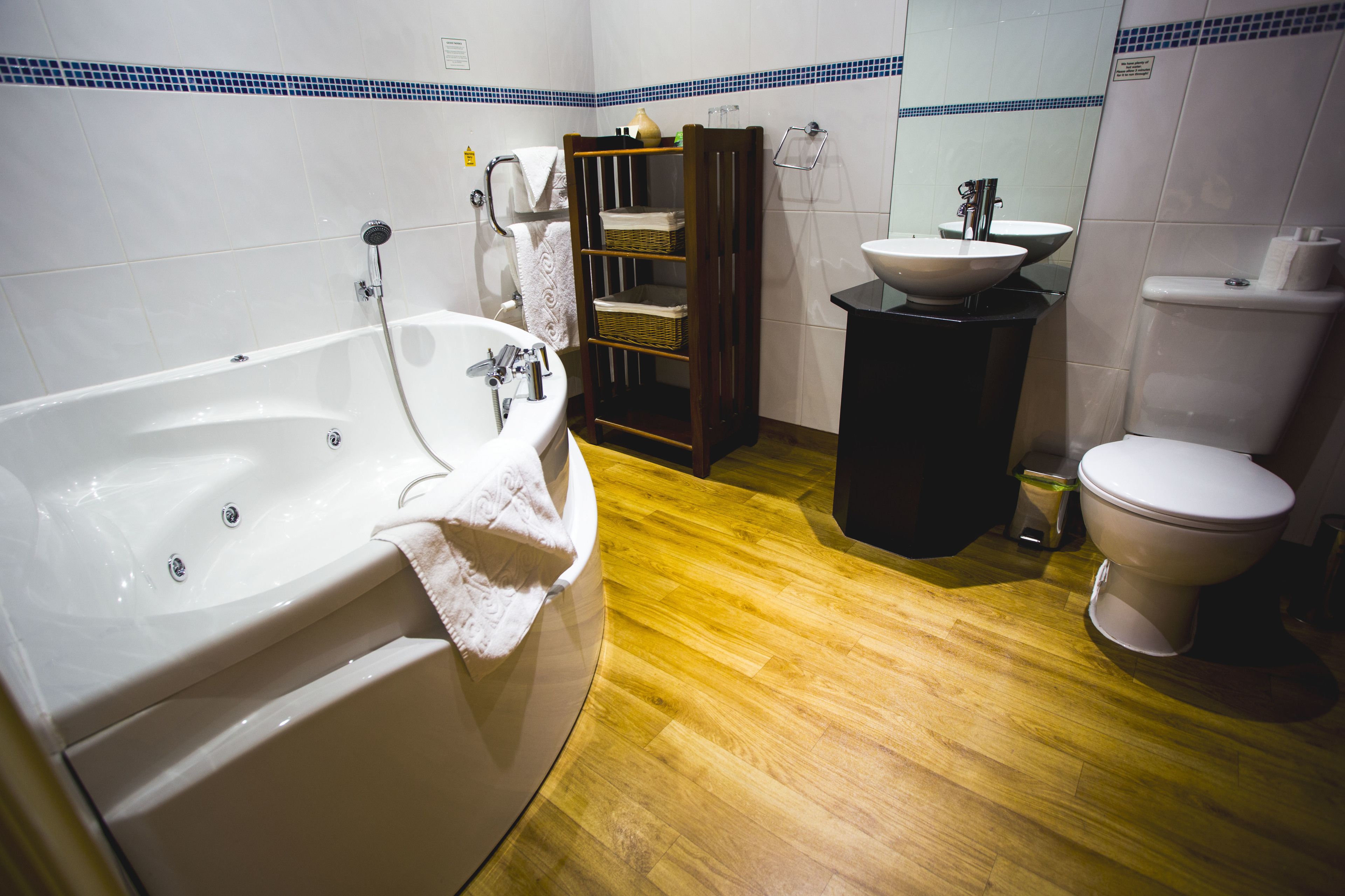 superior double room | bathroom | shower, rainfall showerhead, free toiletries, hair dryer