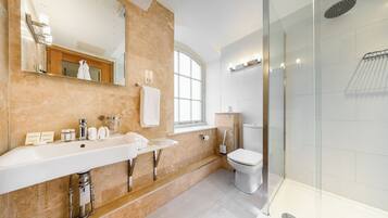 Deluxe Double Room | Bathroom | Shower, designer toiletries, hair dryer, slippers