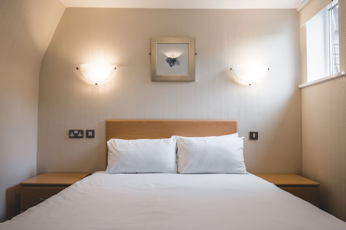 1 bedroom, desk, blackout curtains, iron/ironing board