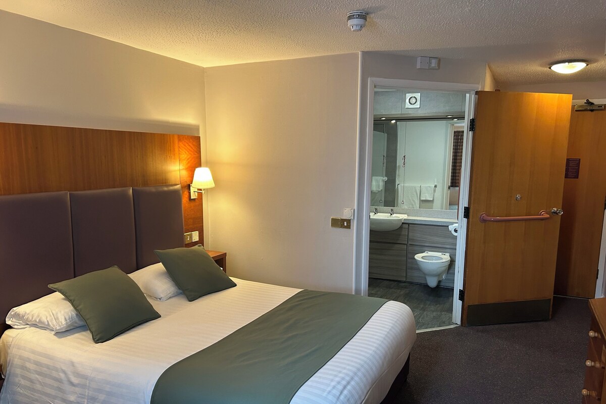 Disabled Double Room | Premium bedding, desk, laptop workspace, blackout drapes