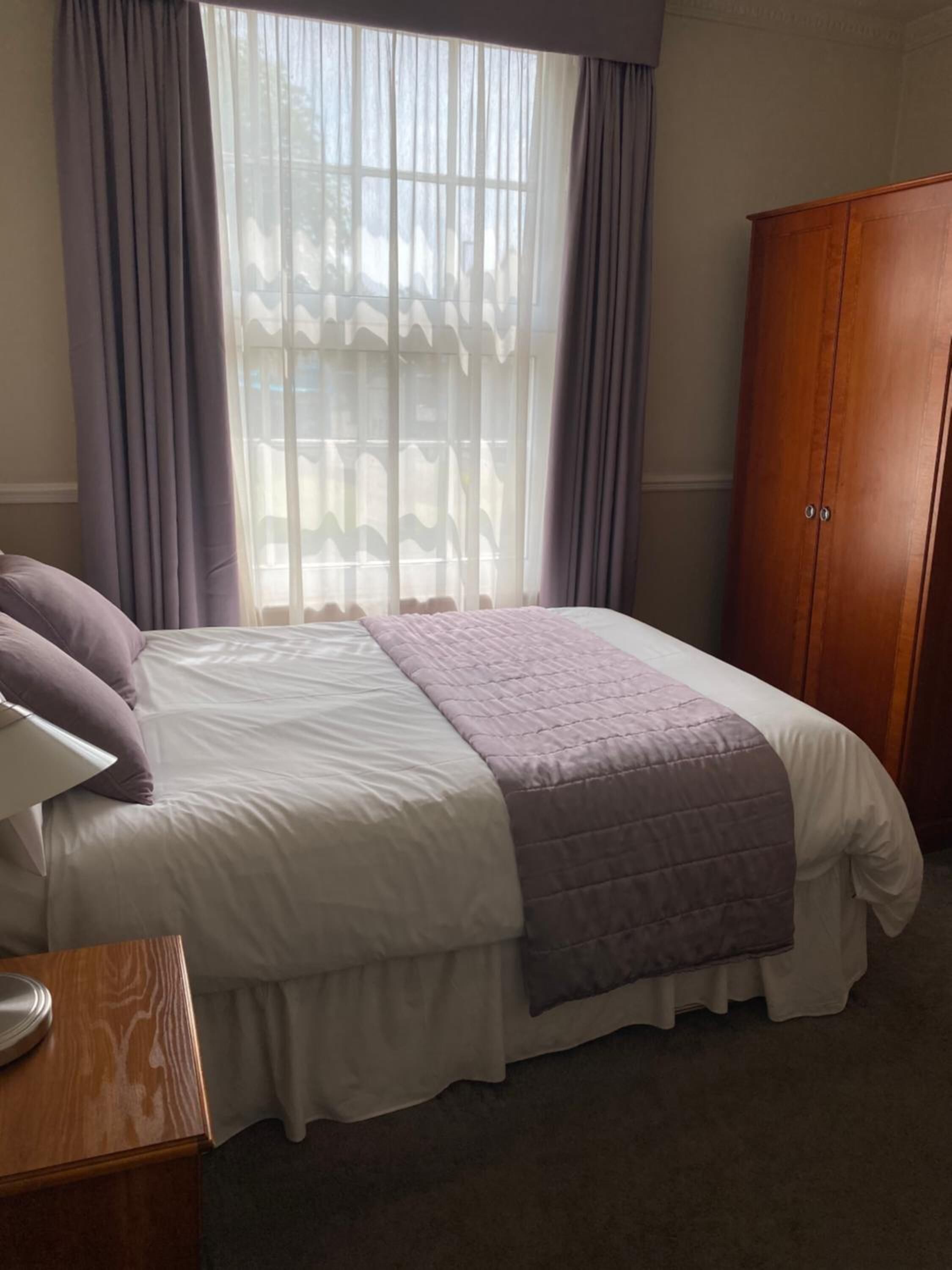 individually decorated, individually furnished, desk, blackout curtains