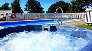 Indoor pool, seasonal outdoor pool, pool umbrellas, sun loungers