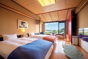 Economy Twin Room | Down comforters, minibar, in-room safe, blackout drapes - Komatsukan Kofutei (Matsushima)