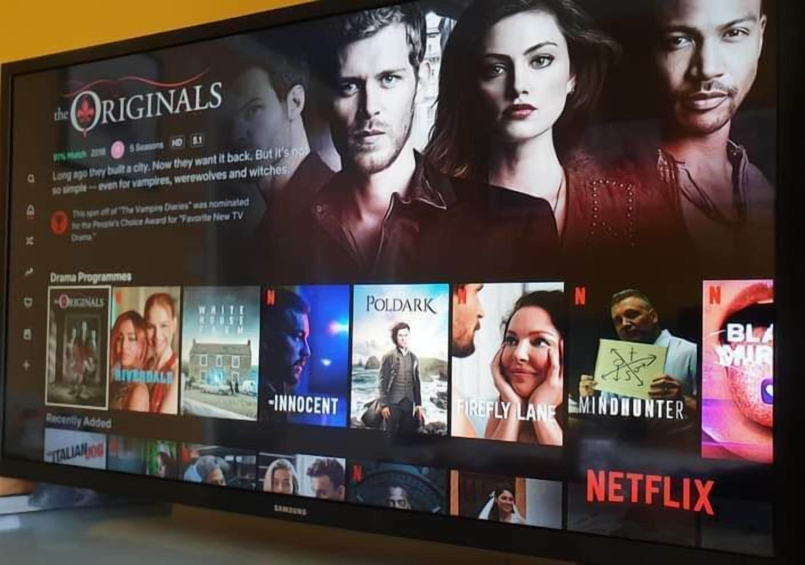 A Netflix interface with various TV show thumbnails.