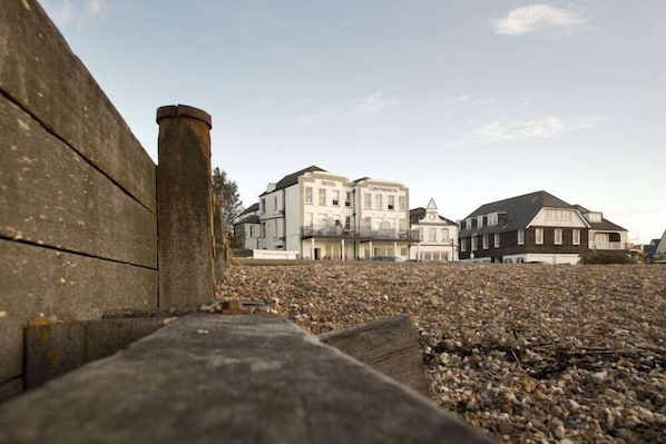 A hotel with a traditional architectural style, featuring a prominent chimney and multiple stories. - Hotel Continental (Whitstable)