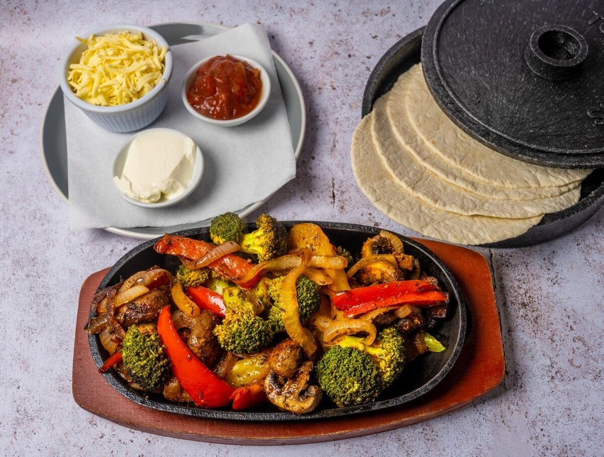 breakfast, lunch served; local and international cuisine, garden views