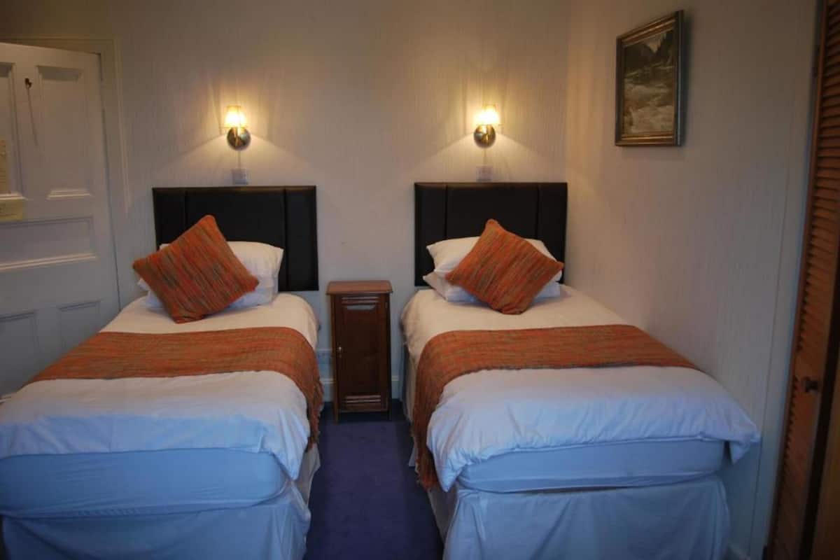 Twin Room, Ground Floor | Desk, iron/ironing board (on request), WiFi (free), bed sheets
