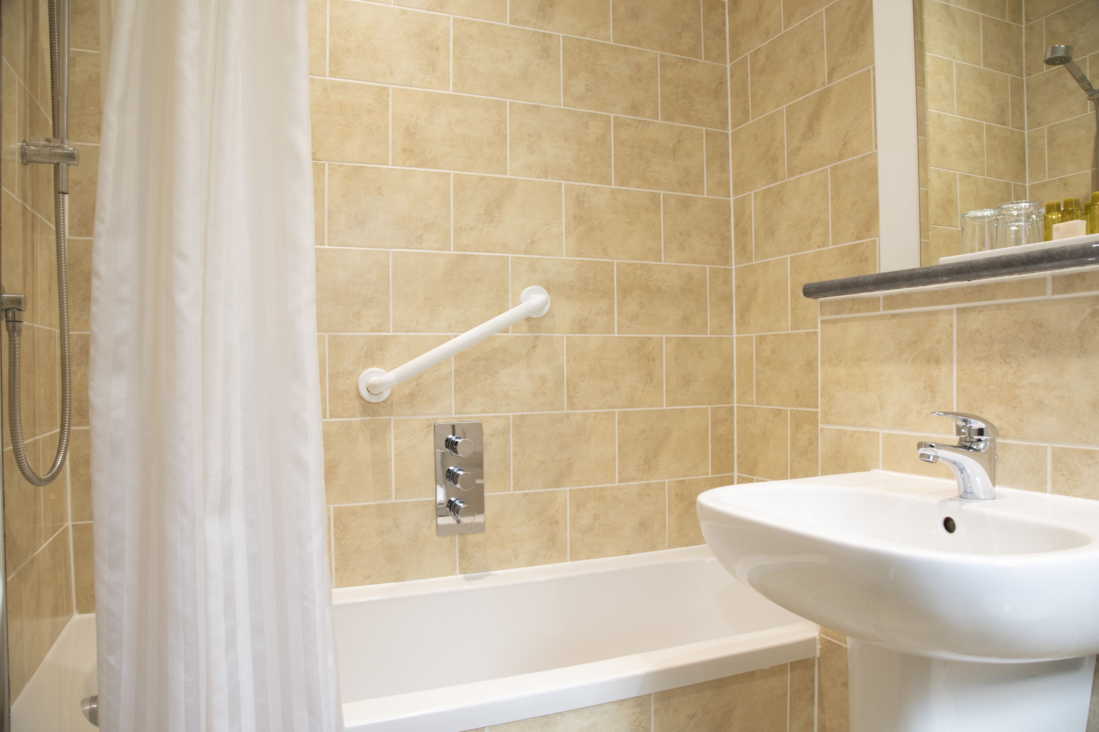 family room | bathroom | deep-soaking bathtub, towels