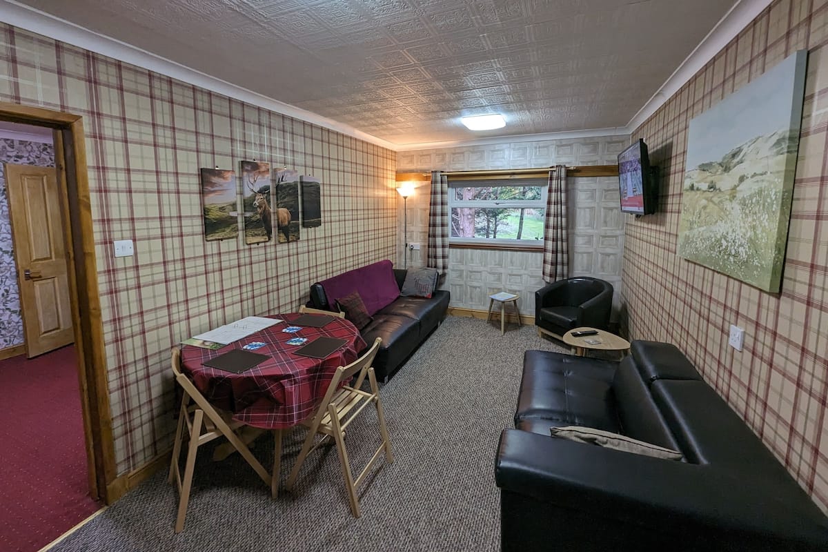 Premier Room, Multiple Beds, Private Bathroom, Garden View | Living area | Flat-screen TV, Netflix