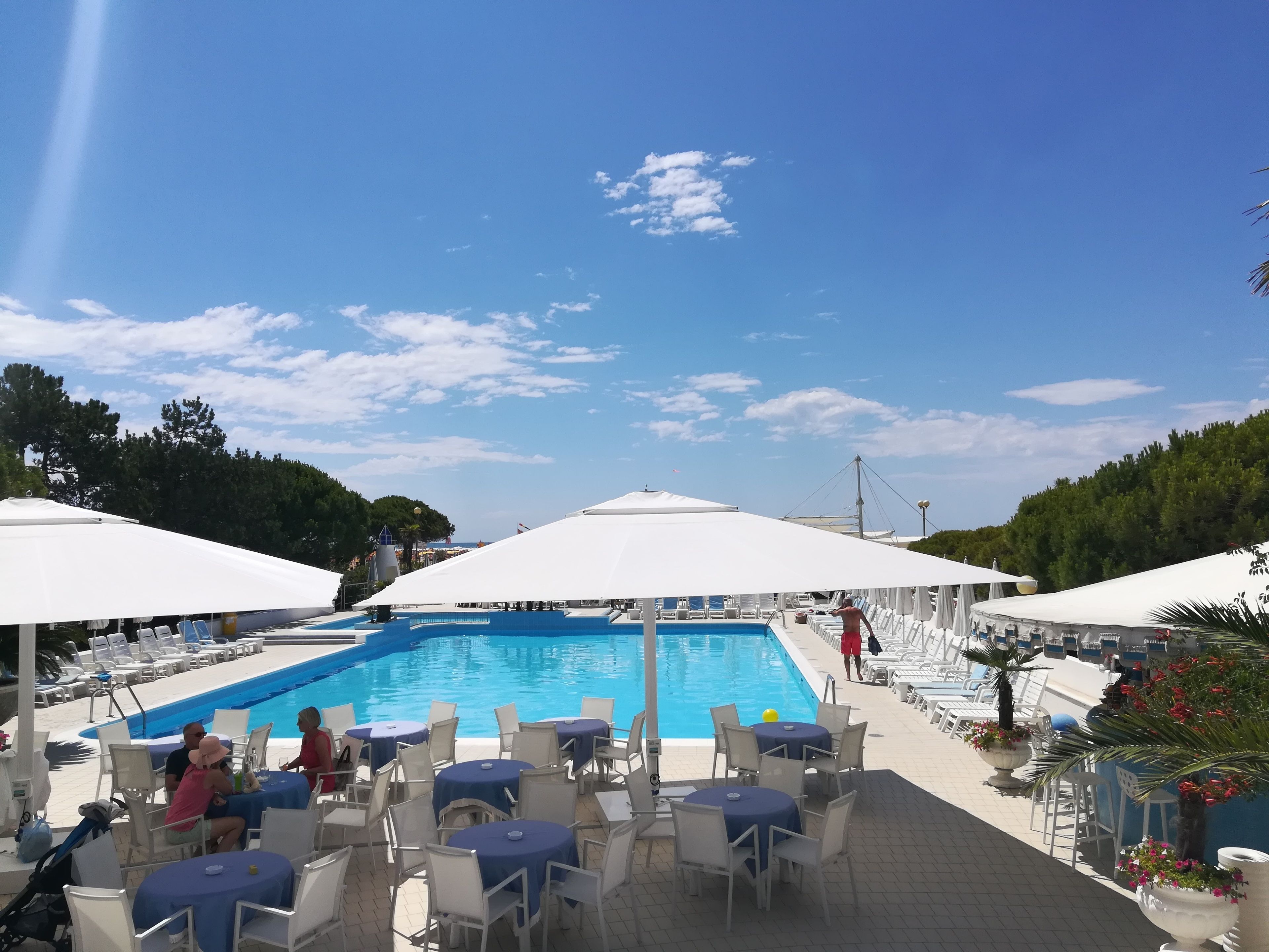 outdoor pool, pool umbrellas, pool loungers