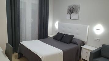 Habitación doble | Cunas gratuitas, wifi gratis, ropa de cama