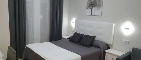 Habitación doble | Cunas gratuitas, wifi gratis, ropa de cama