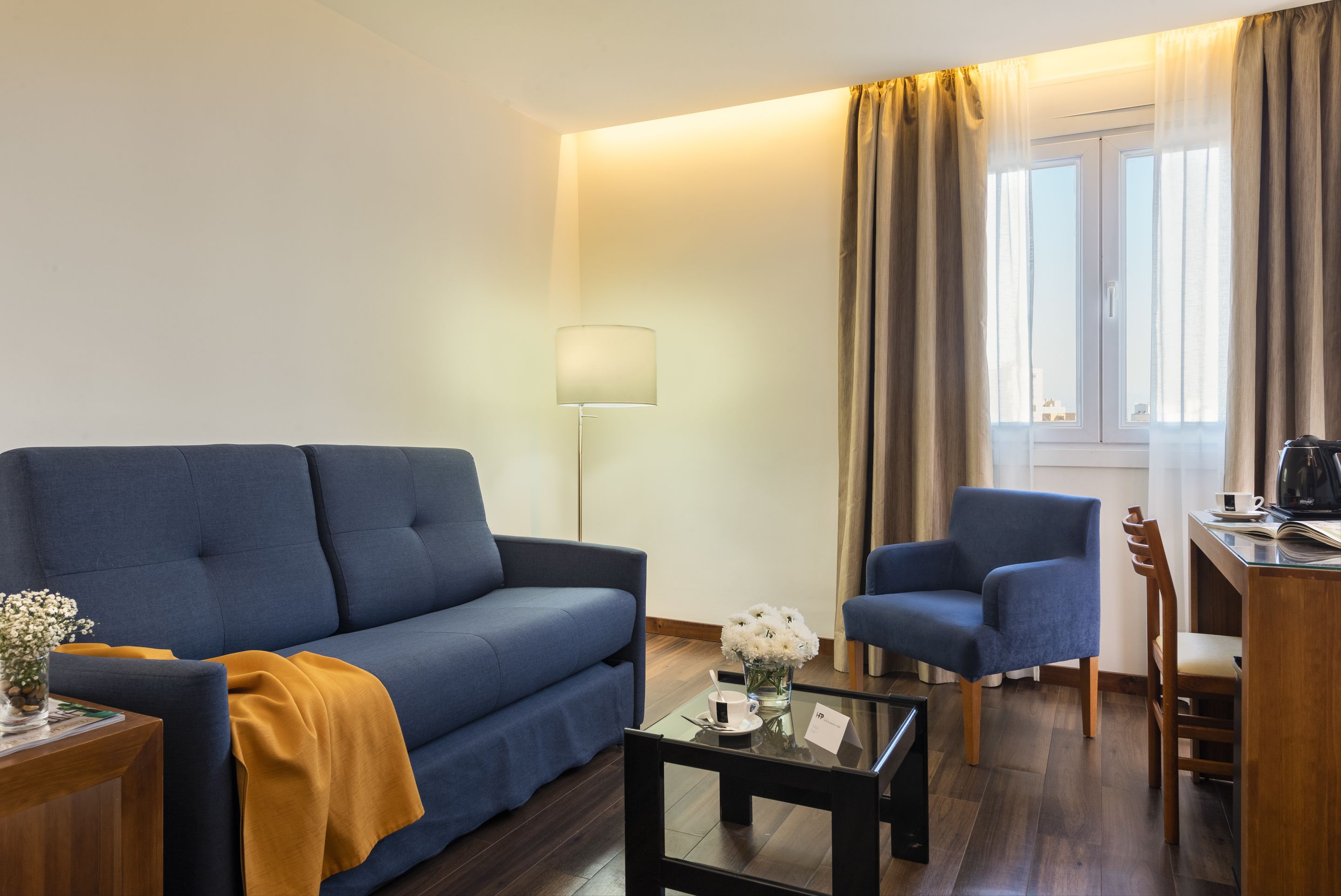 family room | in-room safe, soundproofing, iron/ironing board, free wifi