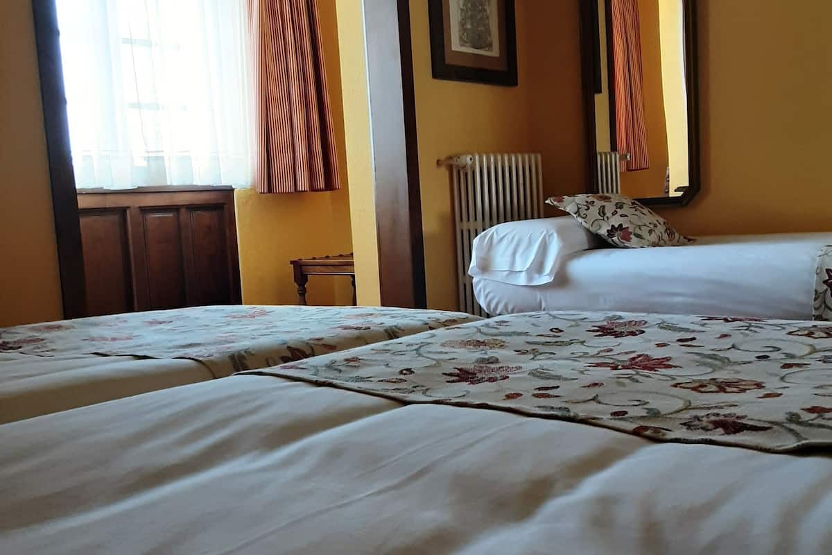 desk, blackout curtains, free cots/infant beds, free wifi