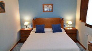 Desk, blackout curtains, iron/ironing board, rollaway beds