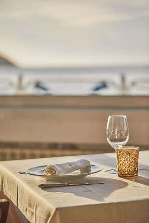 Lunch, dinner served; local cuisine, beach views