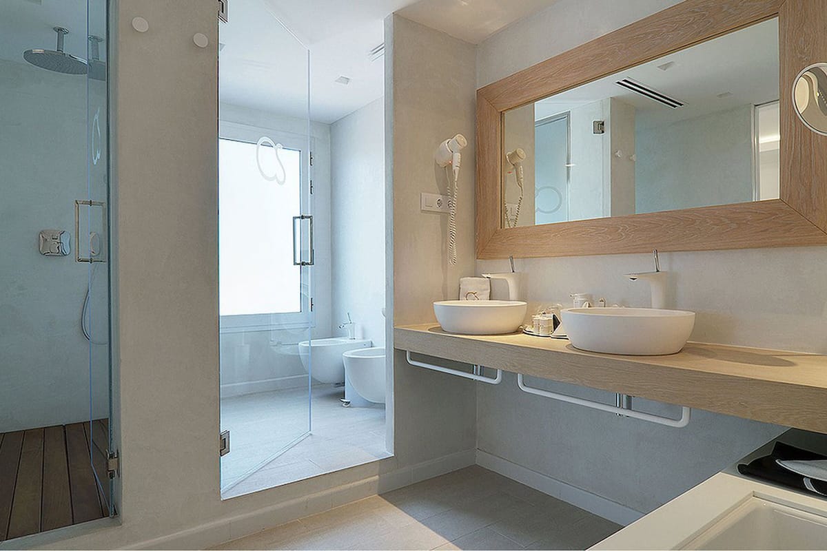 suite, jetted tub, sea view | bathroom | free toiletries, hair dryer, slippers, towels