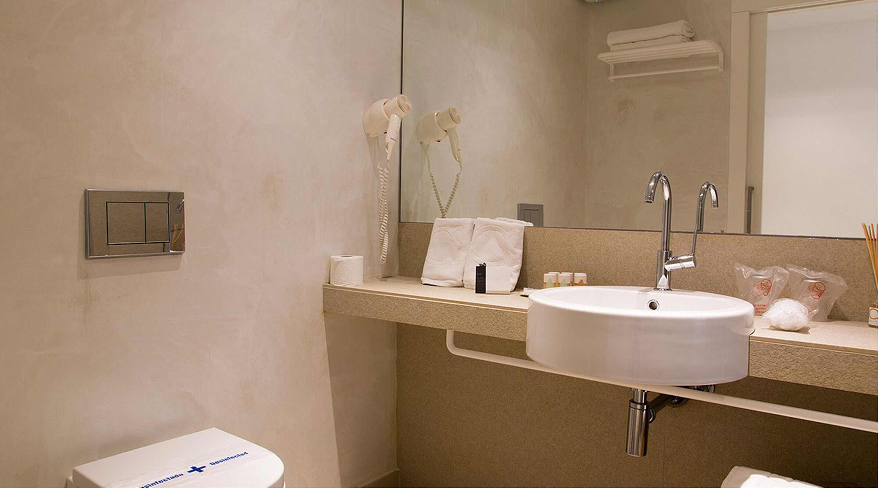 free toiletries, hair dryer, slippers, towels