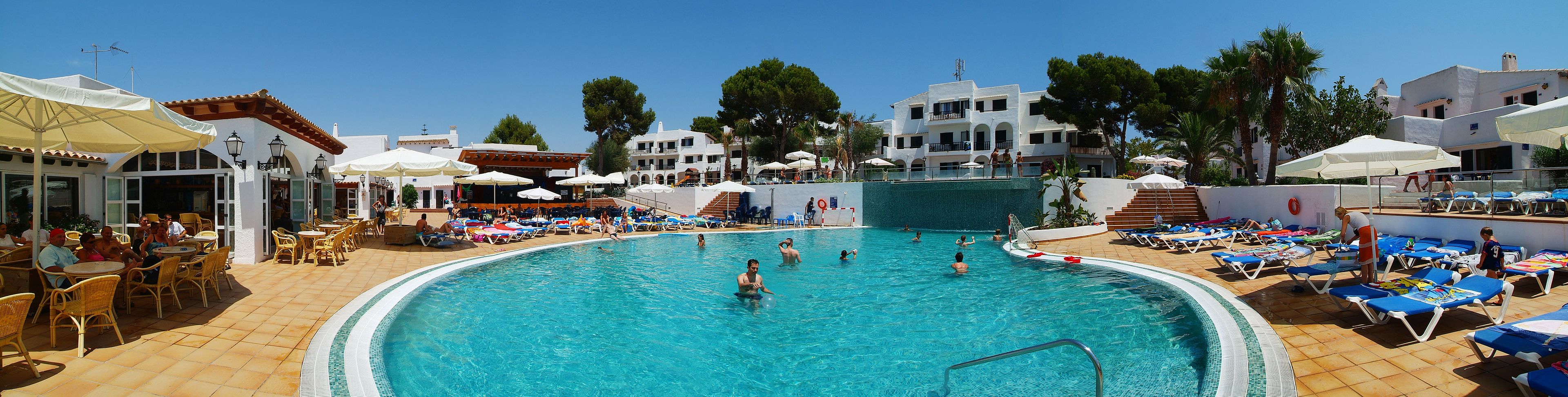 2 outdoor pools, a waterfall pool, pool umbrellas, pool loungers