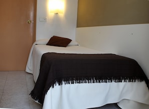 Desk, blackout curtains, free cots/infant beds, WiFi