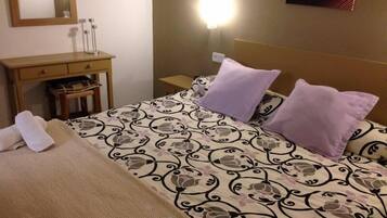 Desk, blackout curtains, free cots/infant beds, WiFi